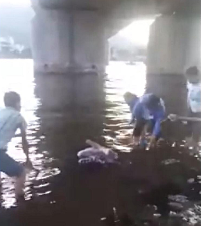 Vụ thi thể bị trói chân tay nổi trên sông ở Đà Nẵng: Nạn nhân làm nghề cho vay tiền - Ảnh 1. Vụ thi thể bị trói chân tay nổi trên sông ở Đà Nẵng: Nạn nhân làm nghề cho vay tiền 1