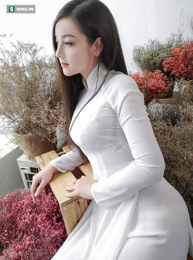 Cô gái được mệnh danh Thiên thần áo dài đáp trả dân mạng sau cáo buộc sửa nát mặt - Ảnh 1. Cô gái được mệnh danh 'Thiên thần áo dài' đáp trả dân mạng sau cáo buộc 'sửa nát mặt' 1