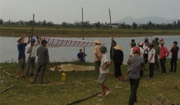 Phát hiện xác chết nữ giới có nhiều vết bầm trôi sông