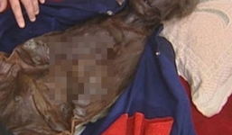 Sống chung với xác mẹ gần 4 năm