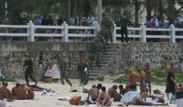 Tắm tiên ở 'Hawaii Trung Quốc' sẽ bị giam đến 10 ngày