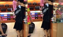 Lộ ảnh Ngọc Trinh bịt mặt đi chợ hàng fake ở Quảng Châu
