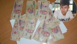 Mang xấp tiền giả 'qua mặt' chủ hiệu cầm đồ
