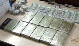 Cụ bà 80 tuổi bị bắt quả tang mua bán 12 bánh heroin