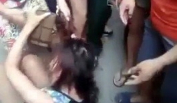 Thiếu nữ bị cắt tóc ngay giữa chợ vì tội trộm đồ