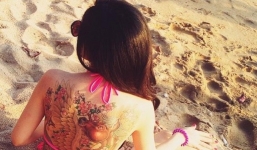 Gái xinh xăm kín lưng diện bikini gây sốt trên bãi biển Nha Trang