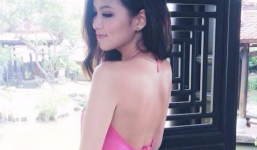 Hoa hậu Diễm Hương diện áo yếm đào gợi cảm