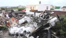 Tai nạn máy bay Đài Loan: Nạn nhân rơi trên nóc nhà dân