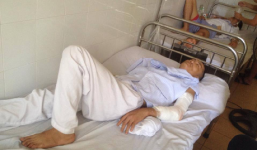 Đưa vợ đi khám thai, bị côn đồ rút súng uy hiếp, chèm gần lìa tay