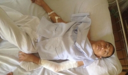 Côn đồ chém đứt gân tay chồng, làm người vợ động thai