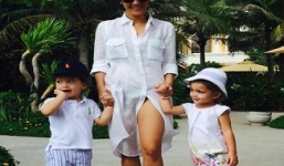 Hồng Nhung diện mốt không quần đưa cặp song sinh đi biển