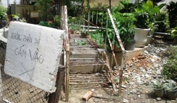 Thi thể người đàn ông trương phình dưới hồ nước bệnh viện