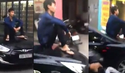 Clip: Nam thanh niên ngồi trên mui xế hộp đang chạy