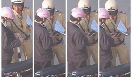 Giải trình của CSGT vụ 'vạch ví': Chỉ lấy tờ rơi quảng cáo?