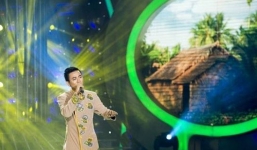 Hoài Lâm diện áo dài trên sân khấu Gương mặt thân quen nhí 2014