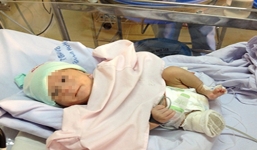 Bé sơ sinh 'văng khỏi bụng mẹ' được xuất viện