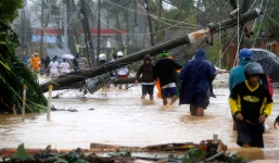 Chùm ảnh: Philippines xơ xác sau khi bão Hagupit đi qua