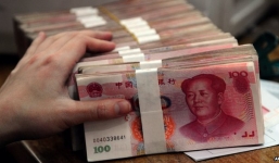 Trung Quốc đốt hàng tấn tiền giấy cũ để chạy nhà máy điện