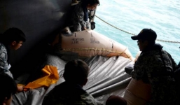 Phát hiện bè cứu sinh đã thổi phồng nghi của máy bay QZ8501