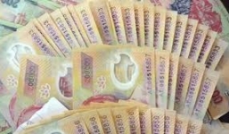 Tự sản xuất tiền giả rồi mang đi mua thẻ điện thoại