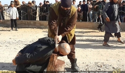 IS chặt đầu một người đàn ông vì 'hành nghề phù thủy'