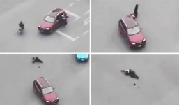 Phẫn nộ tài xế BMW cán vào người CSGT khi bị nhắc nhở