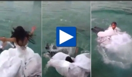 Video: Cô dâu suýt chết đuối vì váy cưới