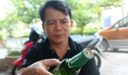 Chai bia Heineken đóng nắp Tiger ở miền Tây