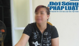 Mẹ ôm con 20 tháng ngồi ngoài đường giữa đêm vì... không được vào nhà