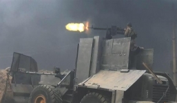 IS dùng xe ủi bọc thép cán chết ít nhất 10 dân thường