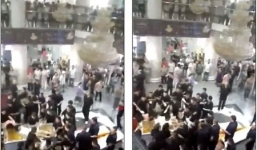 Thang cuốn “nuốt' người: Gia đình làm “đám ma” trong siêu thị