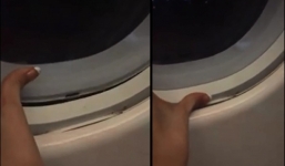 Xuất hiện clip cửa số máy bay VietNam Airlines hở gây hoang mang