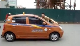 Tài xế ô tô hất CSGT lên nắp capo