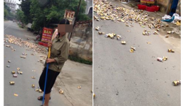 Kỳ quặc người phụ nữ rải hàng trăm lon bia ra đường