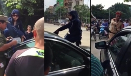 Vụ nhảy lên nóc capo đánh ghen: Cô gái trong xe chỉ ngồi im