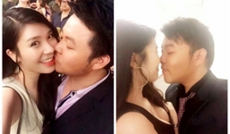 Quang Lê 'âu yếm' bạn gái giữa chốn đông
