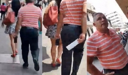 Gã đàn ông quay trộm phụ nữ mặc váy ngắn giữa phố bị bắt tại trận