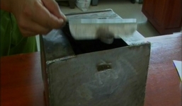 Cạy thùng xe trộm hơn 100 triệu đồng rồi cất giấu trong ổ gà