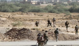 Phát hiện 19 ngôi mộ chứa 365 thi thể phiến quân IS