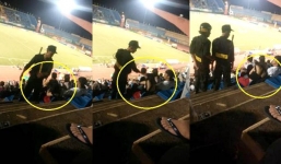 Cảnh sát cơ động tát nữ CĐV trên sân Bình Dương bị xử lý