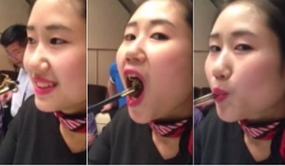 Rùng mình xem cô gái xinh đẹp nuốt chửng bọ cạp sống