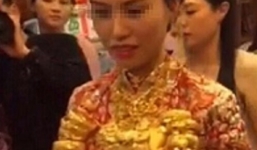 Cô dâu đeo chục kg vàng trong ngày cưới gây xôn xao