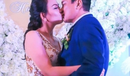 Vợ chồng Hoàng Phúc khóa môi trong tiệc cưới