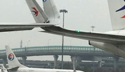 Hai phi cơ chở khách đụng nhau ở sân bay Thượng Hải
