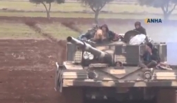 Video: Nữ chiến binh người Kurd lái xe tăng tấn công sân bay ở Aleppo