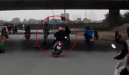 Đôi nam nữ 'đánh võng' nguy hiểm để chạy trốn cảnh sát giao thông