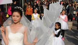 Ngỡ ngàng váy cưới dài 101m có giá 105 triệu đồng