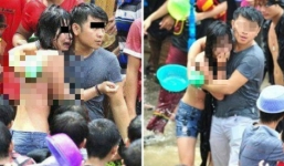Hình ảnh cô gái bật khóc vì bị sàm sỡ trong lễ hội té nước gây phẫn nộ