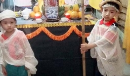 Bố mất phải đặt nằm trên ghế, hai con đi xin tiền mua quan tài