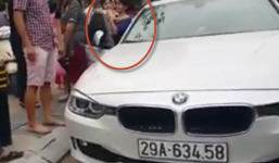 Chủ xe đập vỡ kính 'xế hộp' BMW để giải cứu bé gái 